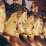 Big Statues - brass Gautama statue in tilt shift photography