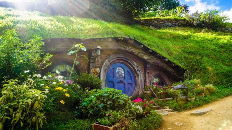 Hobbit House - underground house covered with green grass and plants