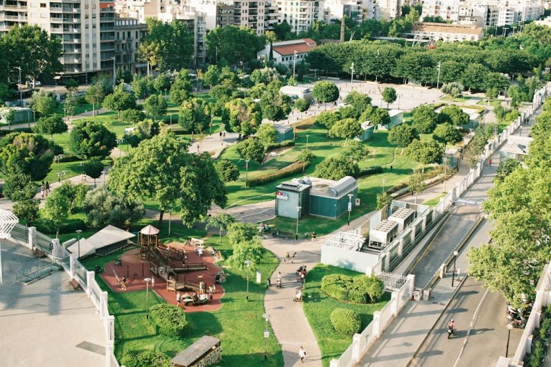 Urban Park - aerial photography plaza with trees and buildings