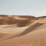 Sand Dune - desert under clear blue sky during daytime